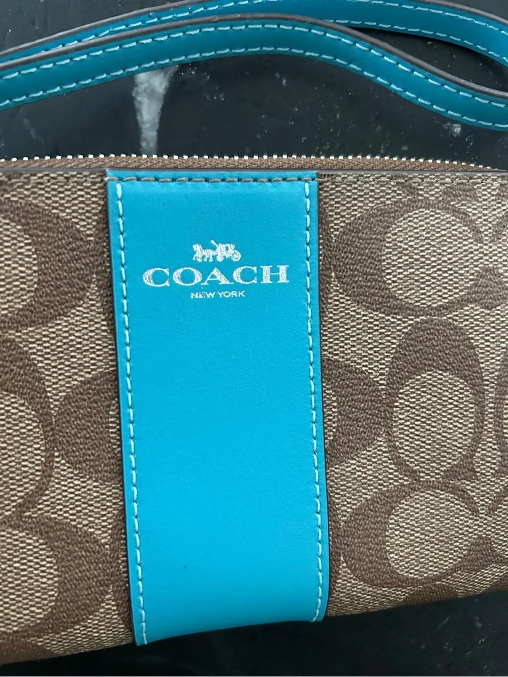 Coach Brown Signature Canvas Wristlet with Turquoise Accent